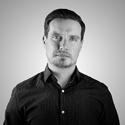 Dan Ford, Founder of Lifestyle Designer, in a black-and-white studio portrait